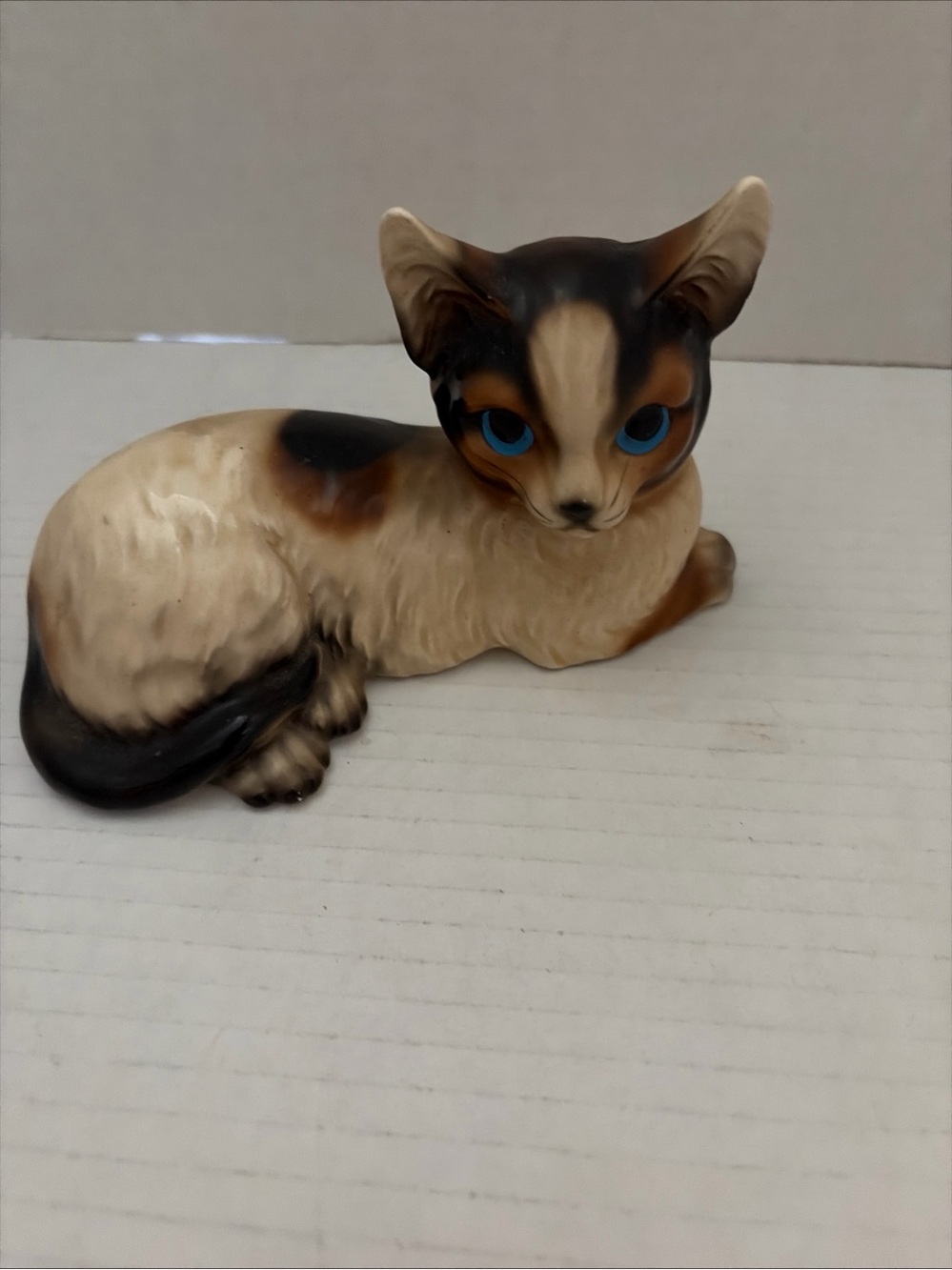 Porcelain Siamese-Style Cat Figurine with Blue Eyes
